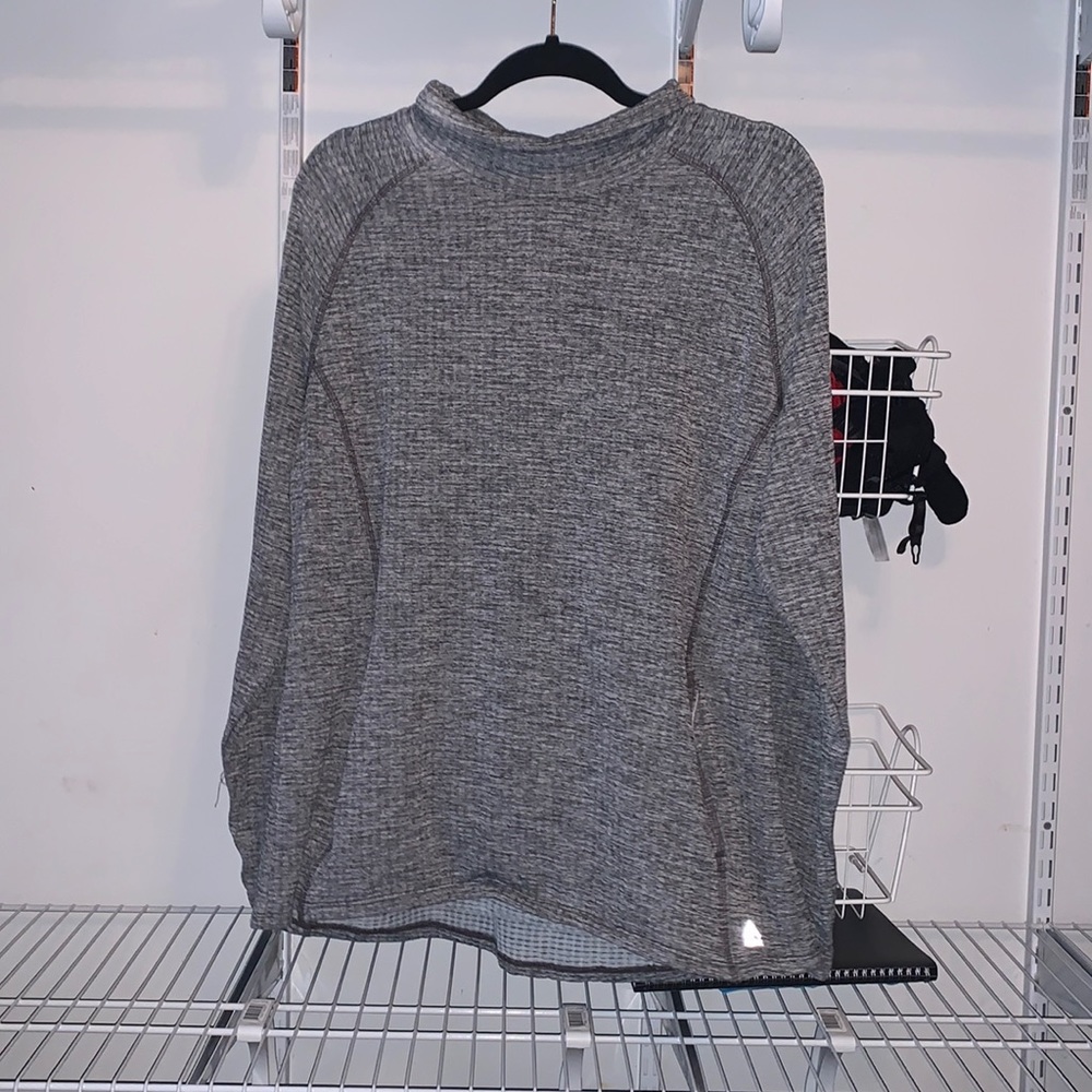 Long sleeve athletic shirt front pocket